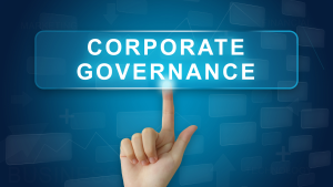 Finger taps a glowing blue sign that reads CORPORATE GOVERNANCE, conveying a focus on governance topics
