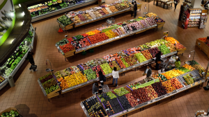 Aerial/top-down view of a supermarket produce department with long rows of colorful fruits and vegetables and shoppers browsing.